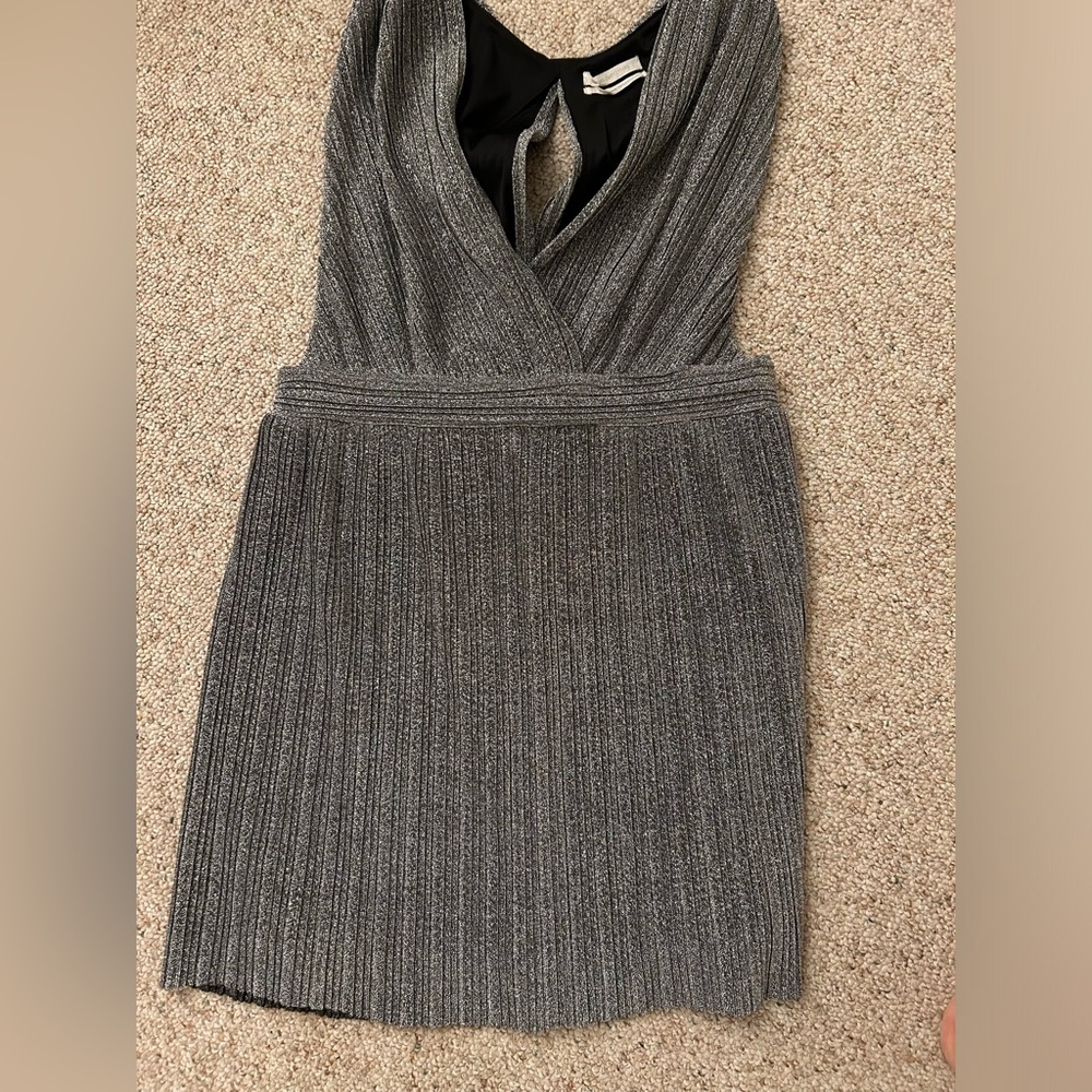 Silver sparkly cocktail dress. Very chic, never worn before! With cut outs!